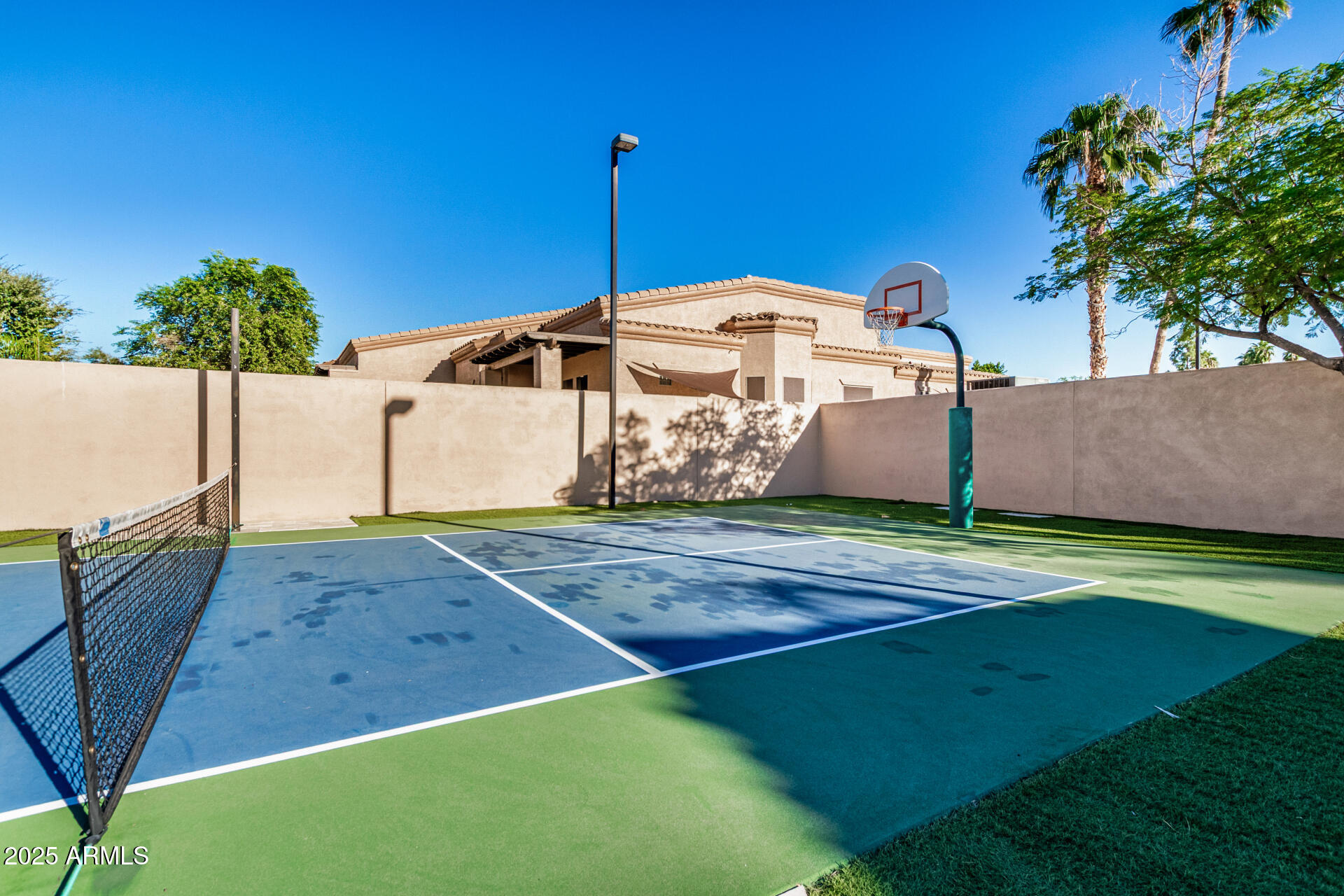 6202 East McKellips Road, Unit 139 Mesa, AZ 85215 - Photo 51 of 54 a front view of a house with garden