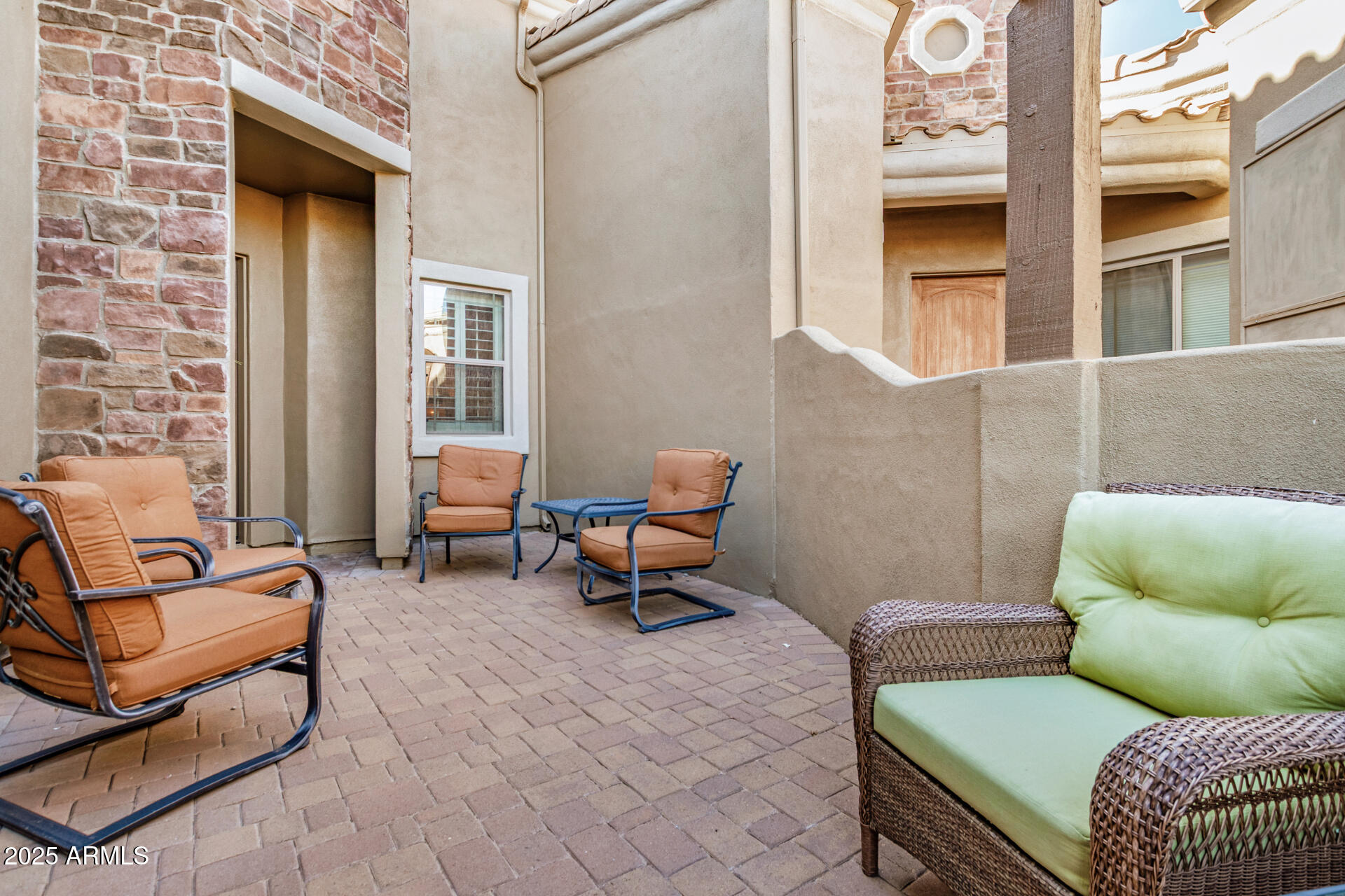 6202 East McKellips Road, Unit 139 Mesa, AZ 85215 - Photo 6 of 54 a outdoor living space with furniture and a window