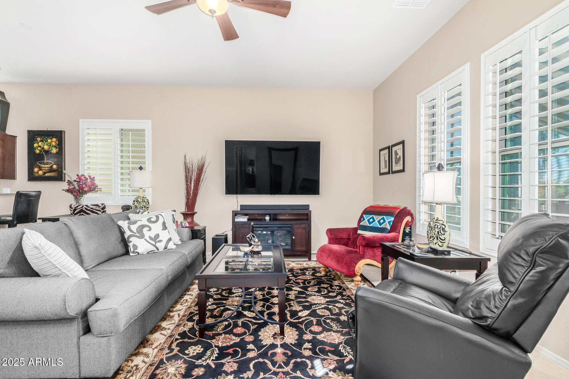6202 East McKellips Road, Unit 139 Mesa, AZ 85215 - Photo 8 of 54 a living room with furniture and a flat screen tv