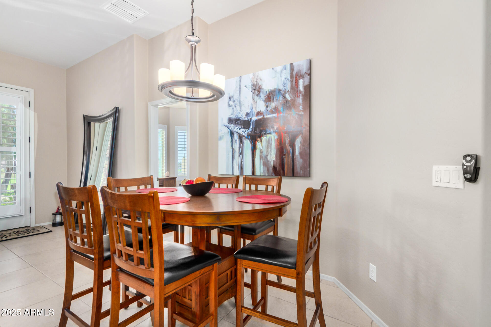 6202 East McKellips Road, Unit 139 Mesa, AZ 85215 - Photo 10 of 54 a view of a dining room with furniture and window