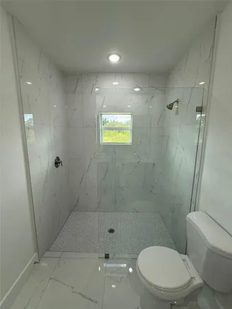 an empty room with a bathroom