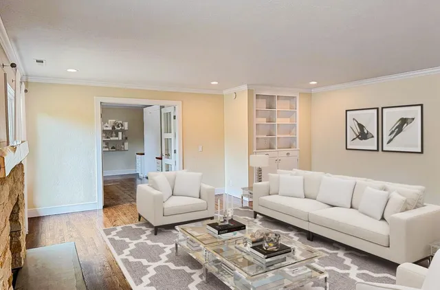 a living room with furniture and a couch