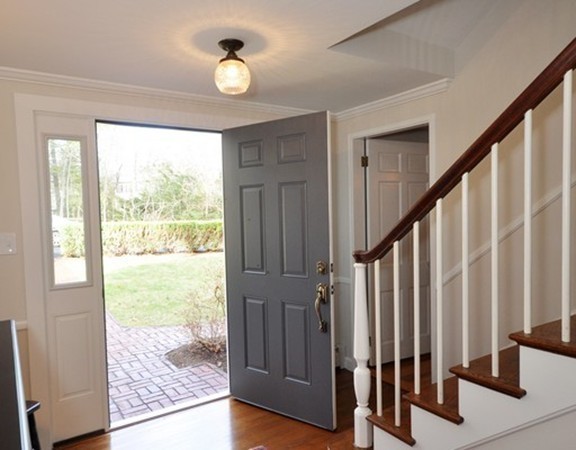 13 Garland Road Concord, MA 01742 - Photo 4 of 28 a view of an entryway with wooden floor and door