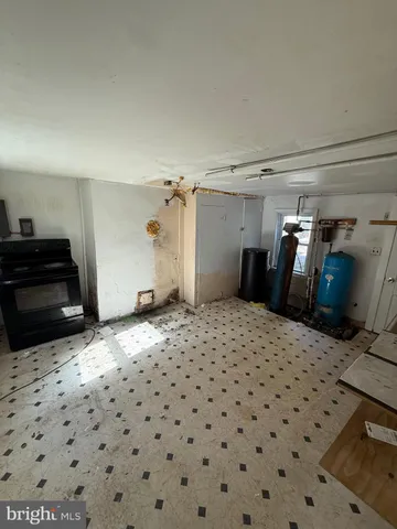 a room with a storage and utility room