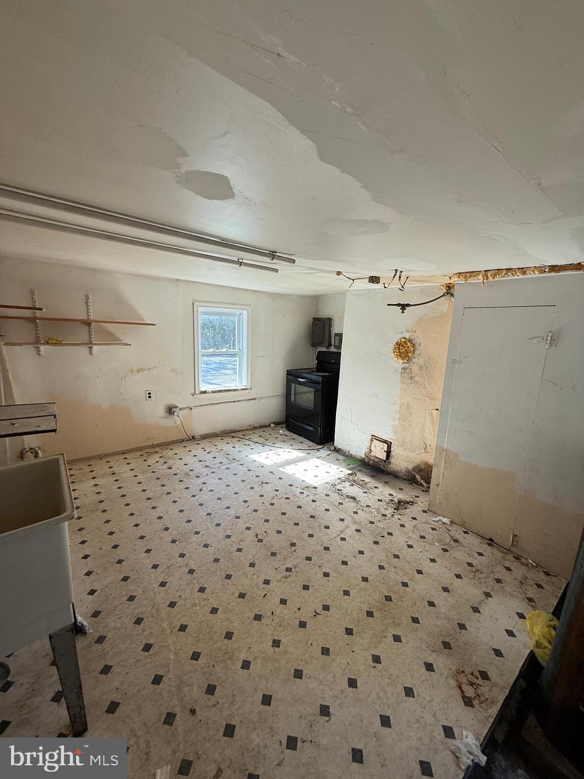 943 Cayots Corner Road Chesapeake City, MD 21915 - Photo 21 of 33 a room with a storage and utility room