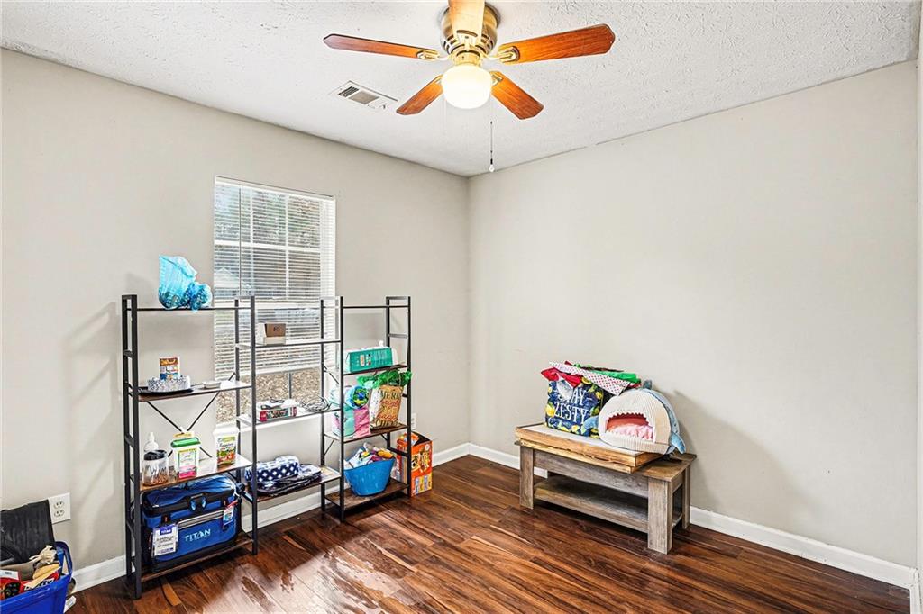 30 Pheasant Court Monticello, GA 31064 - Photo 15 of 30 a living room with furniture and a window