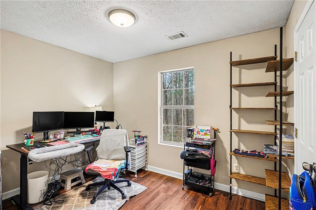 30 Pheasant Court Monticello, GA 31064 - Photo 17 of 30 a view of a workspace with furniture and a window