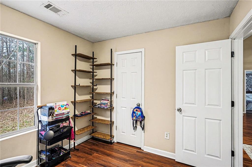30 Pheasant Court Monticello, GA 31064 - Photo 18 of 30 a view of a livingroom with furniture and hardwood floor