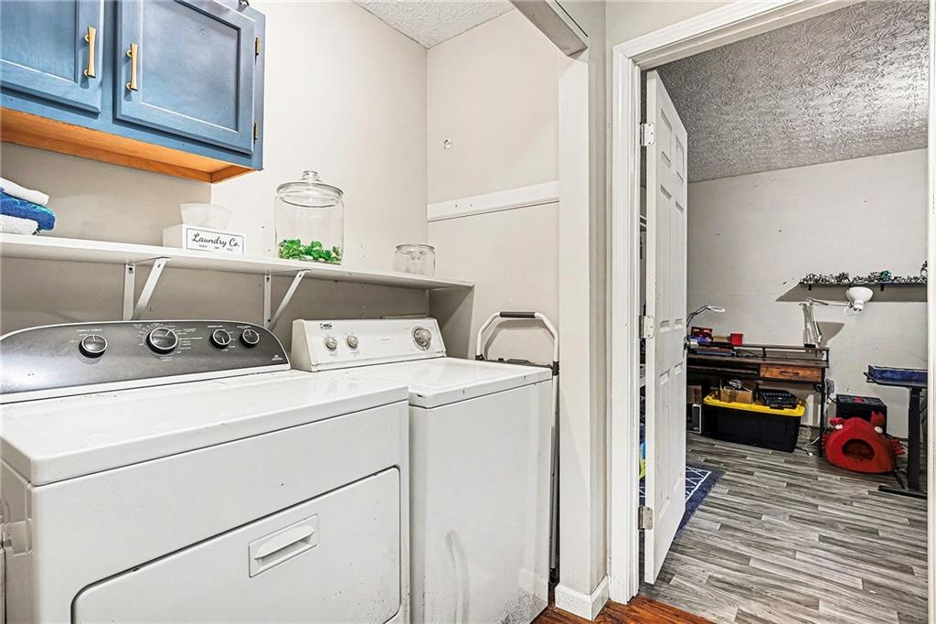 30 Pheasant Court Monticello, GA 31064 - Photo 25 of 30 a utility room with dryer and washer