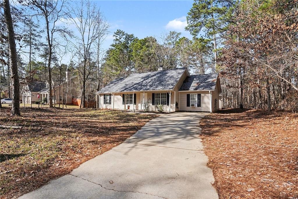 30 Pheasant Court Monticello, GA 31064 - Photo 5 of 30 a view of a yard in front of house