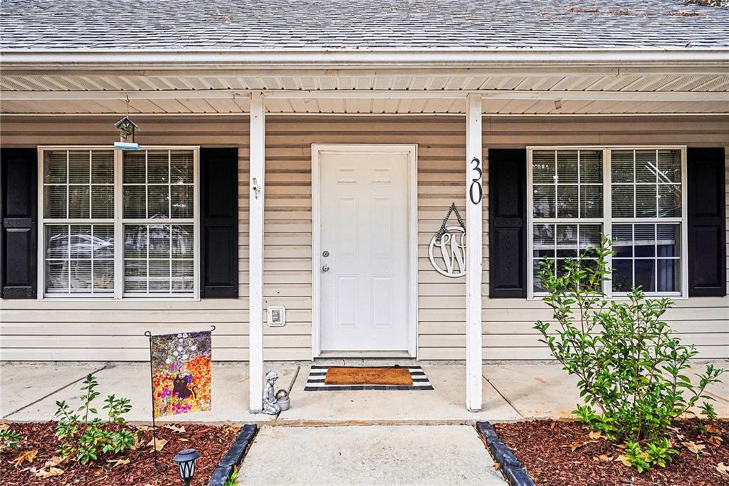 30 Pheasant Court Monticello, GA 31064 - Photo 6 of 30 a front view of a house with large windows
