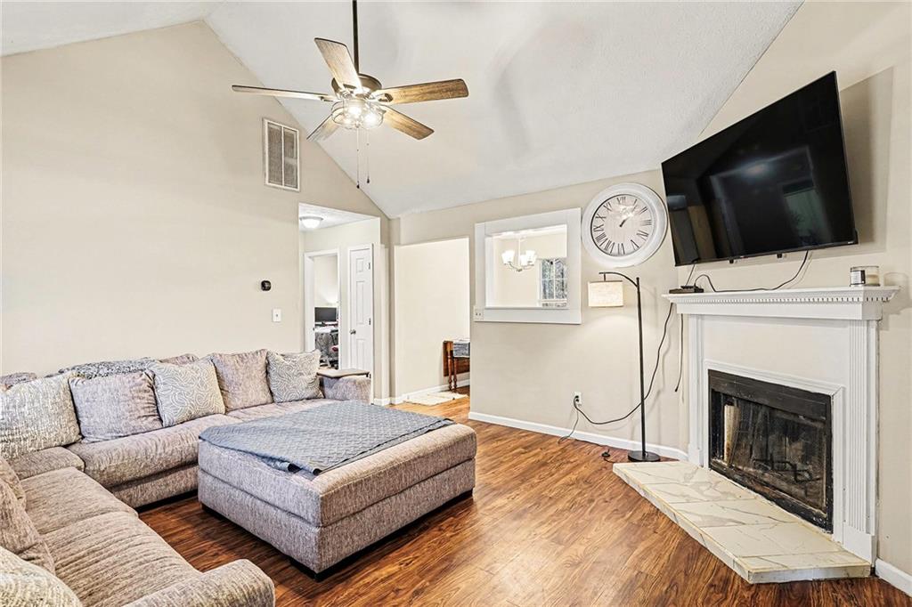 30 Pheasant Court Monticello, GA 31064 - Photo 8 of 30 a living room with furniture and a flat screen tv