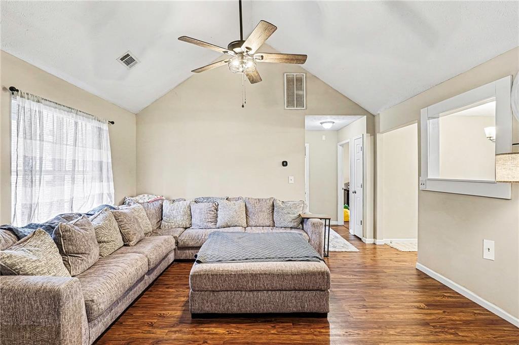 30 Pheasant Court Monticello, GA 31064 - Photo 9 of 30 a living room with furniture and a large window