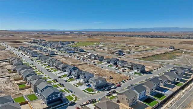an aerial view of beach and ocean