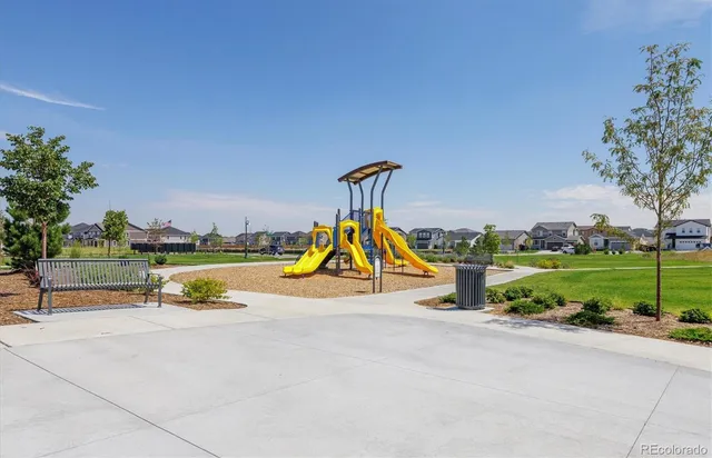 a view of a park with a slide