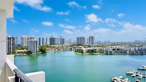 a view of a lake with a city