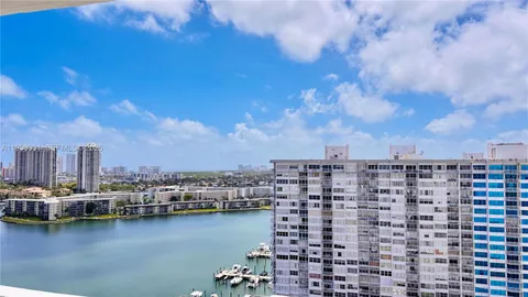 a view of a city with tall buildings