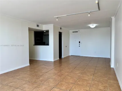 a kitchen with stainless steel appliances granite countertop a sink a stove and a microwave