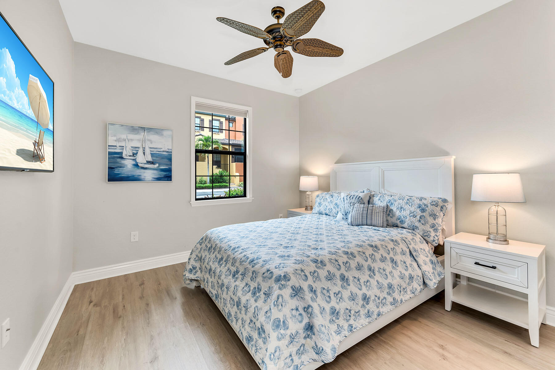 9066 Albion Lane North, Unit 5101 Naples, FL 34113 - Photo 22 of 48 a bedroom with a bed and a window