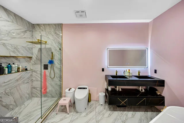 a work room with furniture and a window