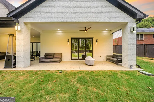 an aerial view of a house with a garden