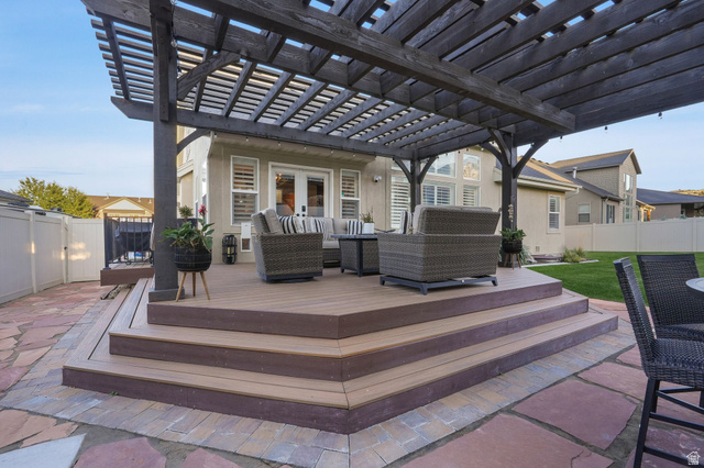 14738 Tangle Hill Road Herriman, UT 84096 - Photo 62 of 66 Expansive outdoor living area featuring a multi-level composite deck with wide steps