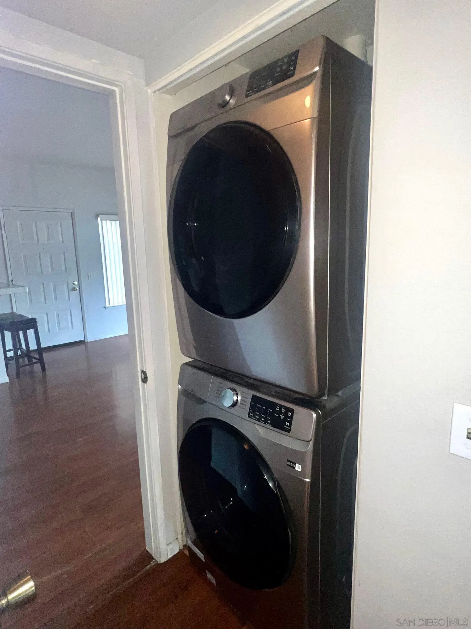 13802 Midland Road Poway, CA 92064 - Photo 10 of 12 a view of a hallway with washer and dryer