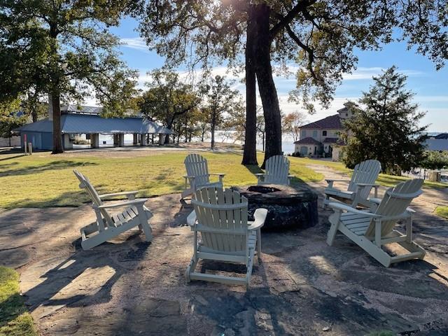107 Bay Tree Trail Mabank, TX 75156 - Photo 7 of 16 a view of a swimming pool with a lounge chairs