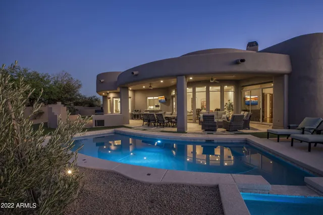 a view of a balcony with chairs