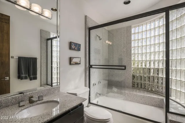 a utility room with a sink a washer and dryer