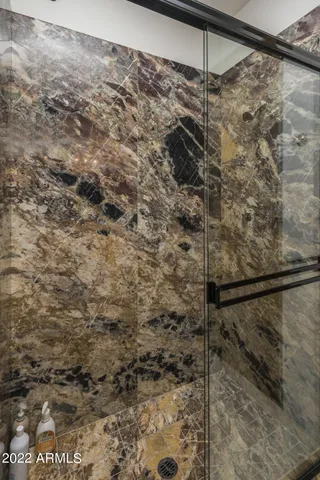 a view of city from balcony with seating space