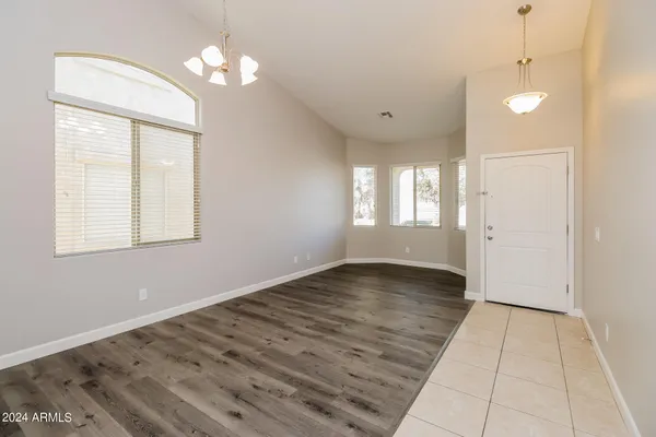 a kitchen with stainless steel appliances a refrigerator stove microwave and sink