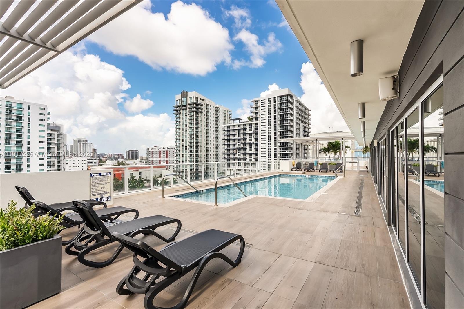 321 Northeast 26th Street, Unit 614 Miami, FL 33137 - Photo 13 of 22 a view of balcony patio deck and outdoor seating