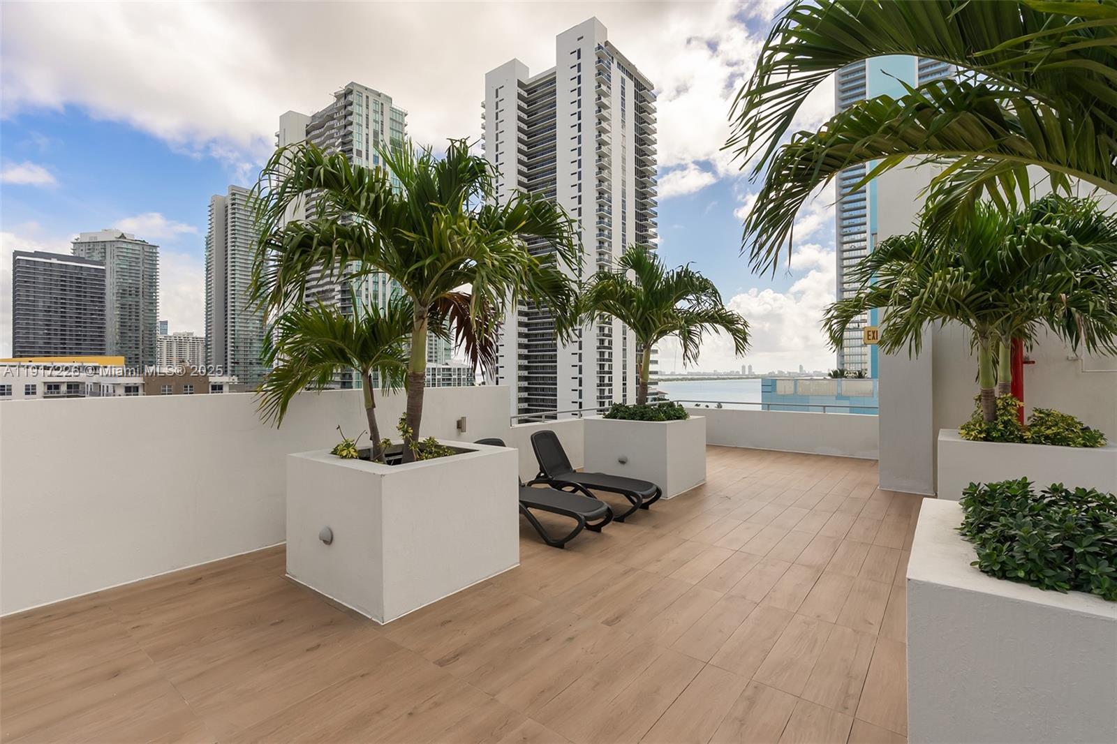 321 Northeast 26th Street, Unit 614 Miami, FL 33137 - Photo 15 of 22 a view of outdoor space with palm trees