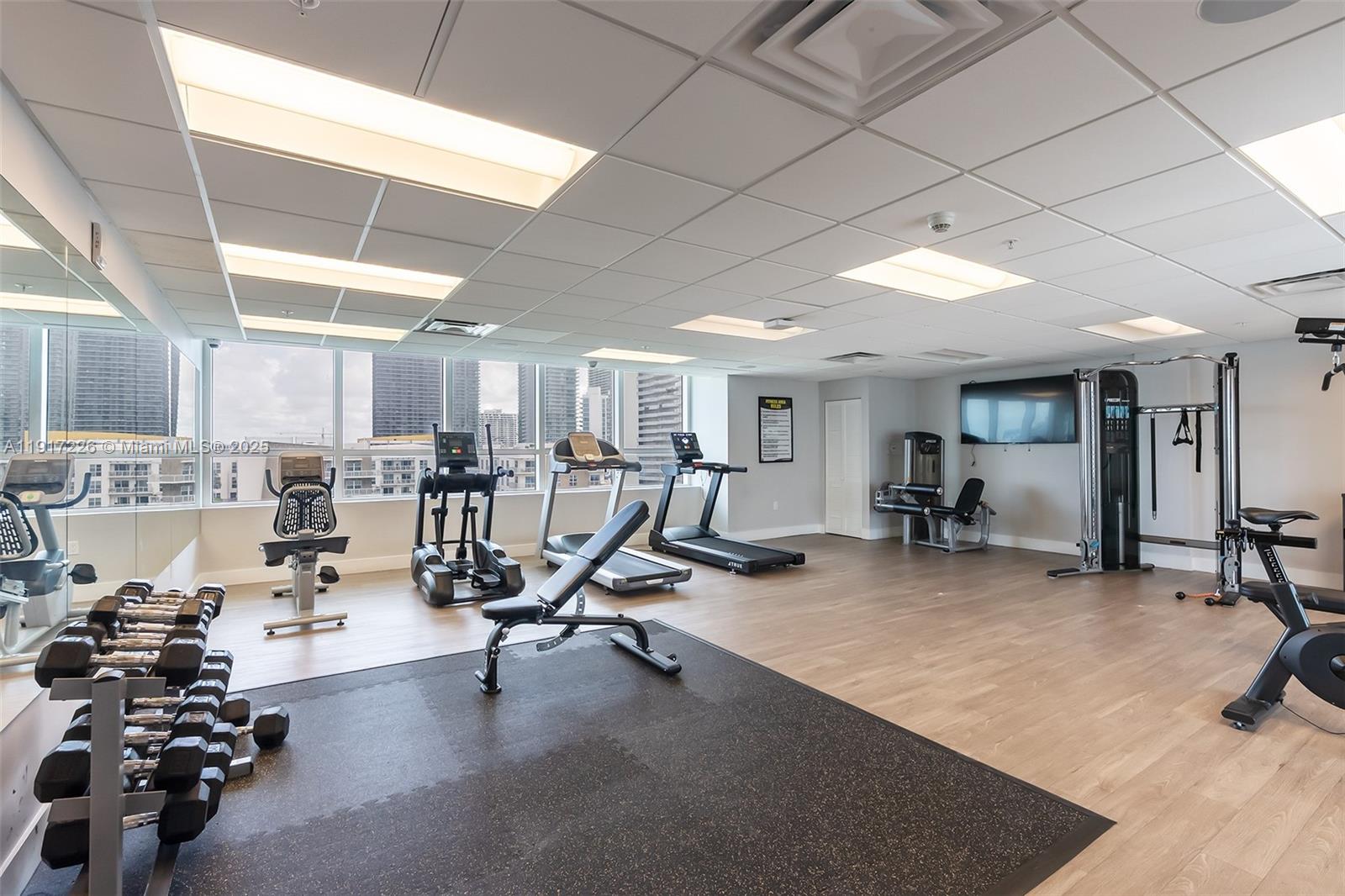 321 Northeast 26th Street, Unit 614 Miami, FL 33137 - Photo 16 of 22 a view of a room with gym equipment