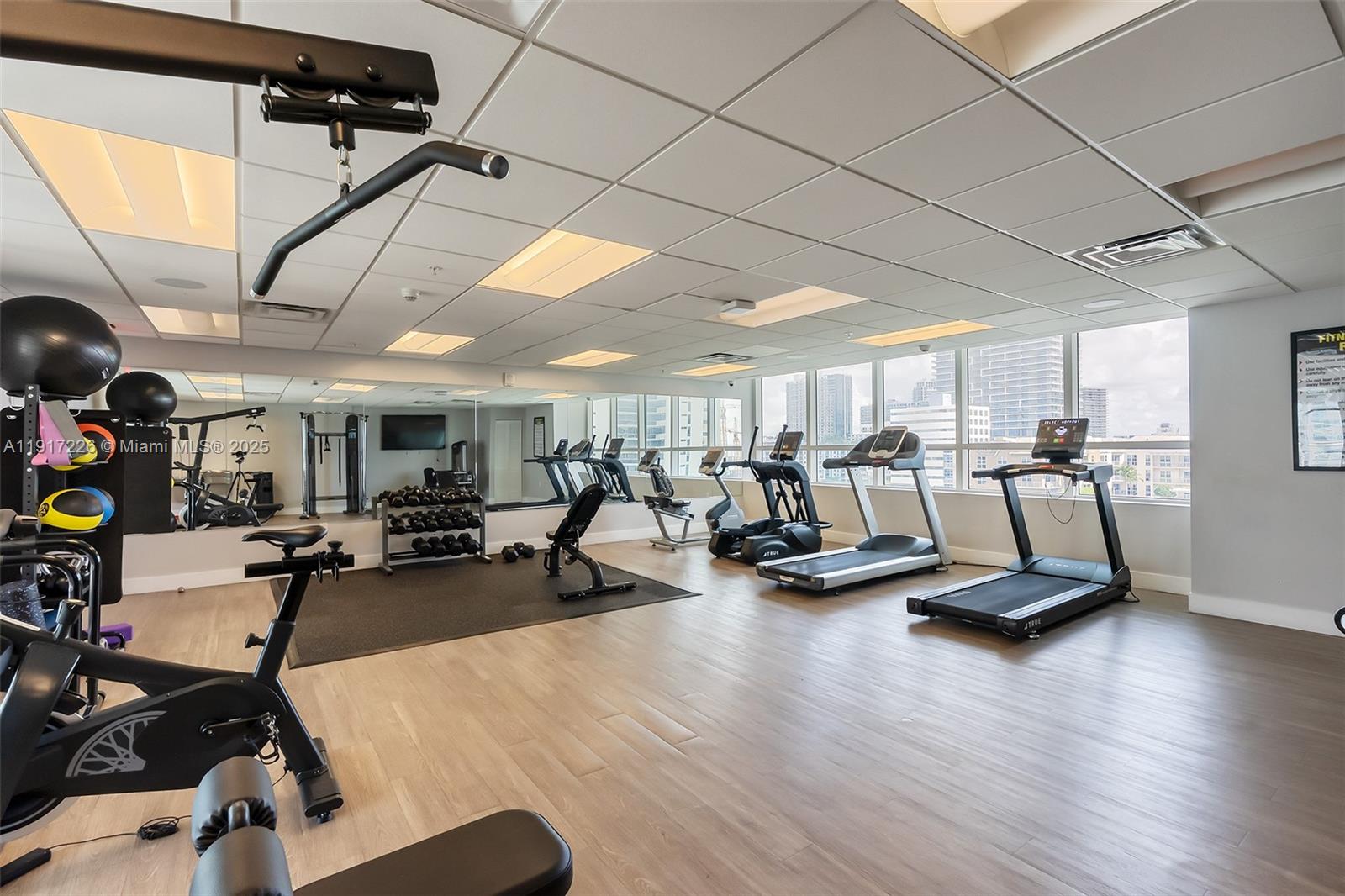 321 Northeast 26th Street, Unit 614 Miami, FL 33137 - Photo 17 of 22 a view of a room with gym equipment