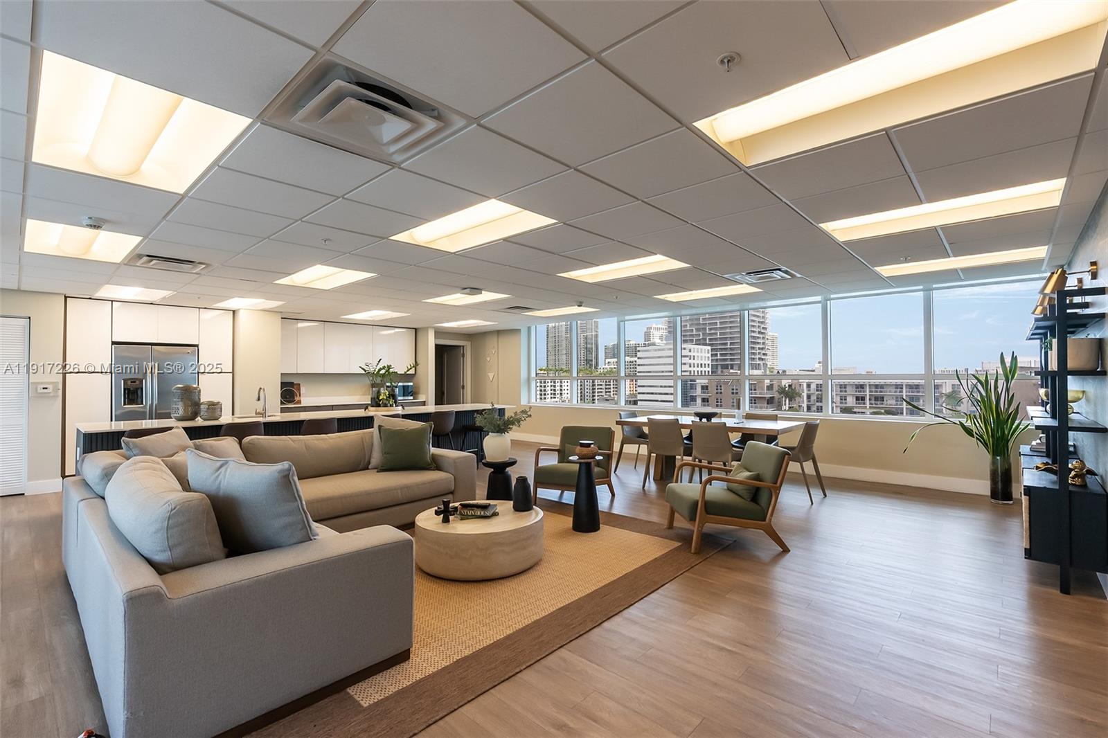 321 Northeast 26th Street, Unit 614 Miami, FL 33137 - Photo 18 of 22 a living room with lots of furniture and a large window