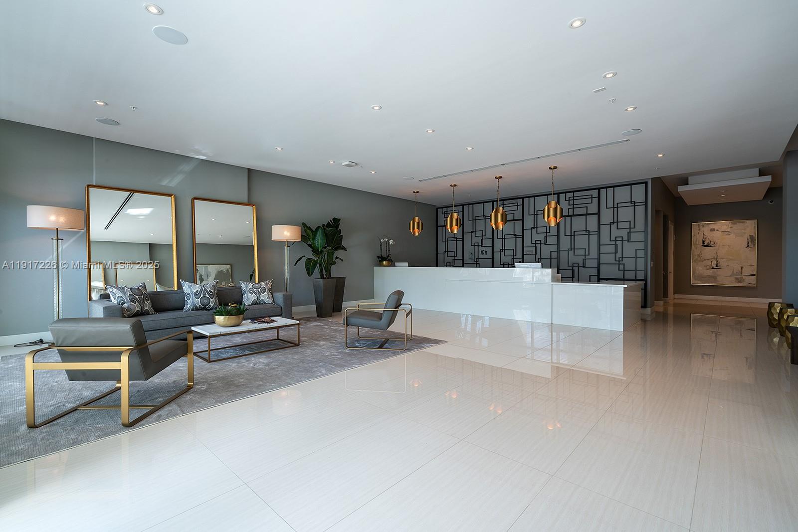 321 Northeast 26th Street, Unit 614 Miami, FL 33137 - Photo 22 of 22 a living room with furniture and a table