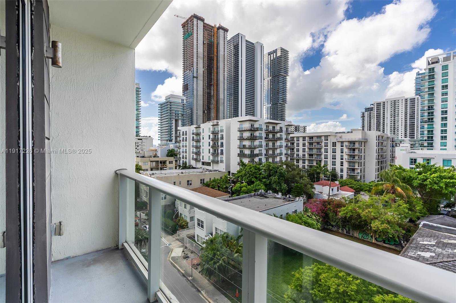 321 Northeast 26th Street, Unit 614 Miami, FL 33137 - Photo 10 of 22 a view of balcony with wooden floor