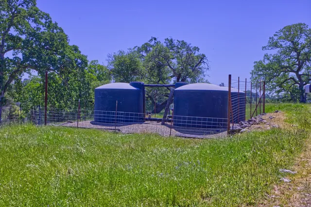 a view of a chair and table of the garden