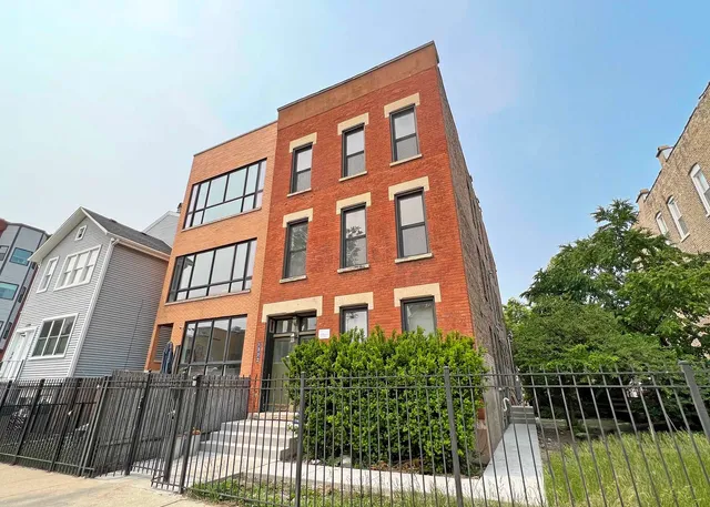 a front view of a multi story building