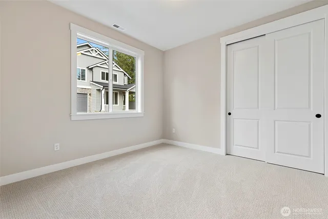 a view of a room that has a window in it