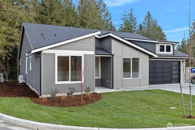 front view of a house and a yard