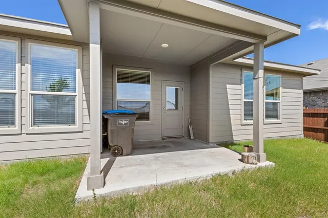 a house view with a backyard space