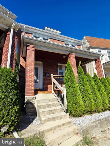 a view of a house with a porch