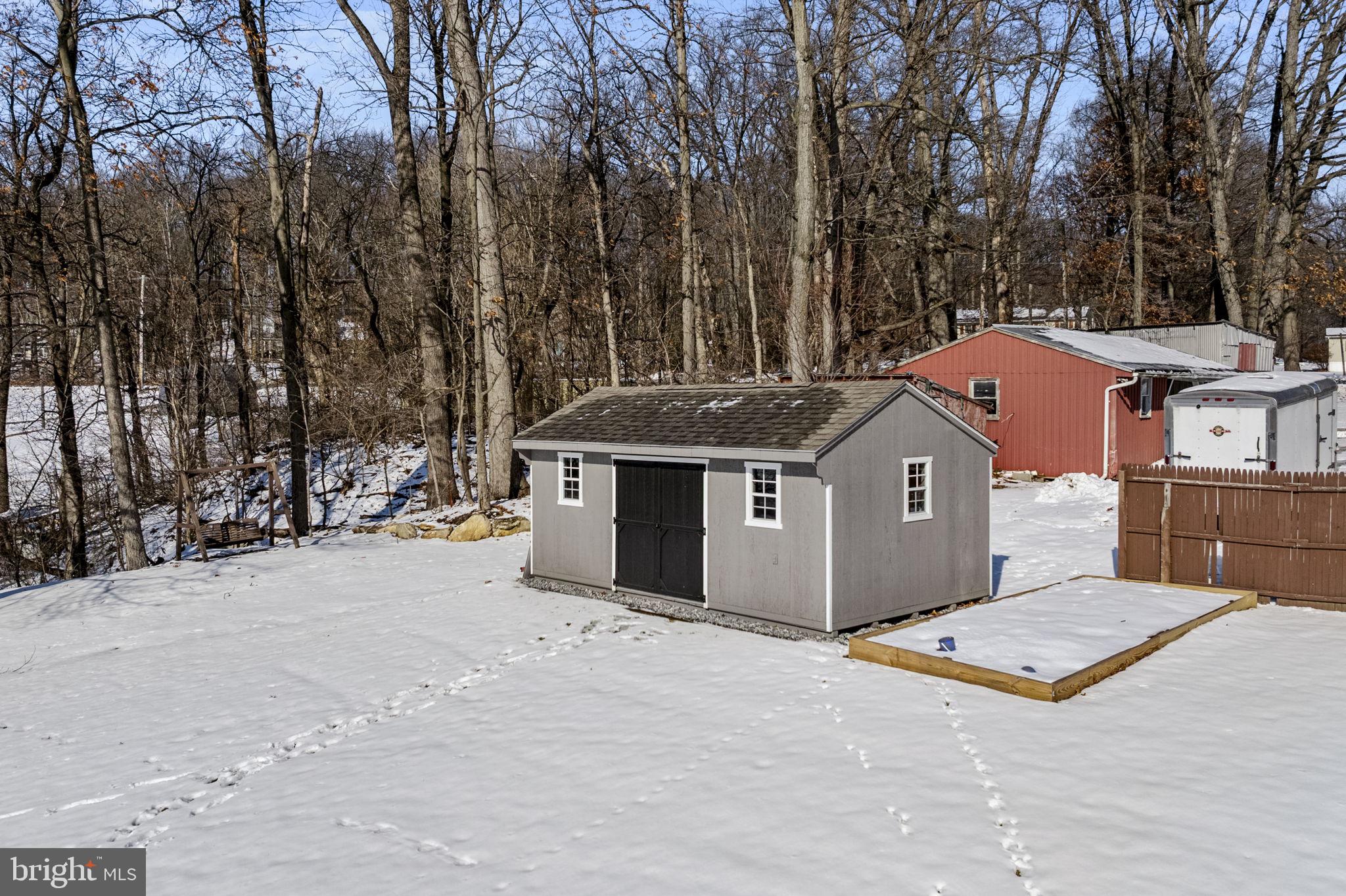 108 Red Well Road New Holland, PA 17557 - Photo 20 of 59 a big house with a large tree in front of it