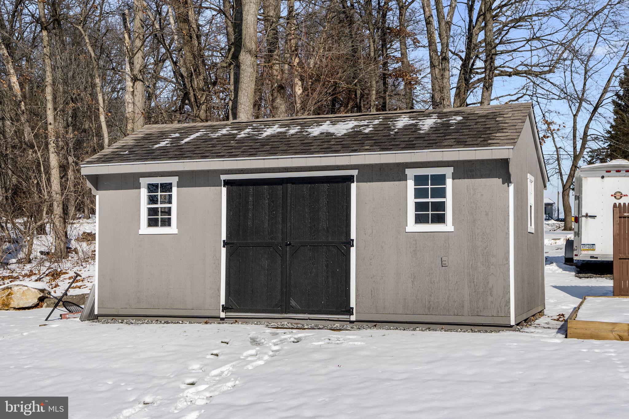 108 Red Well Road New Holland, PA 17557 - Photo 21 of 59 a house that has a tree in front of it
