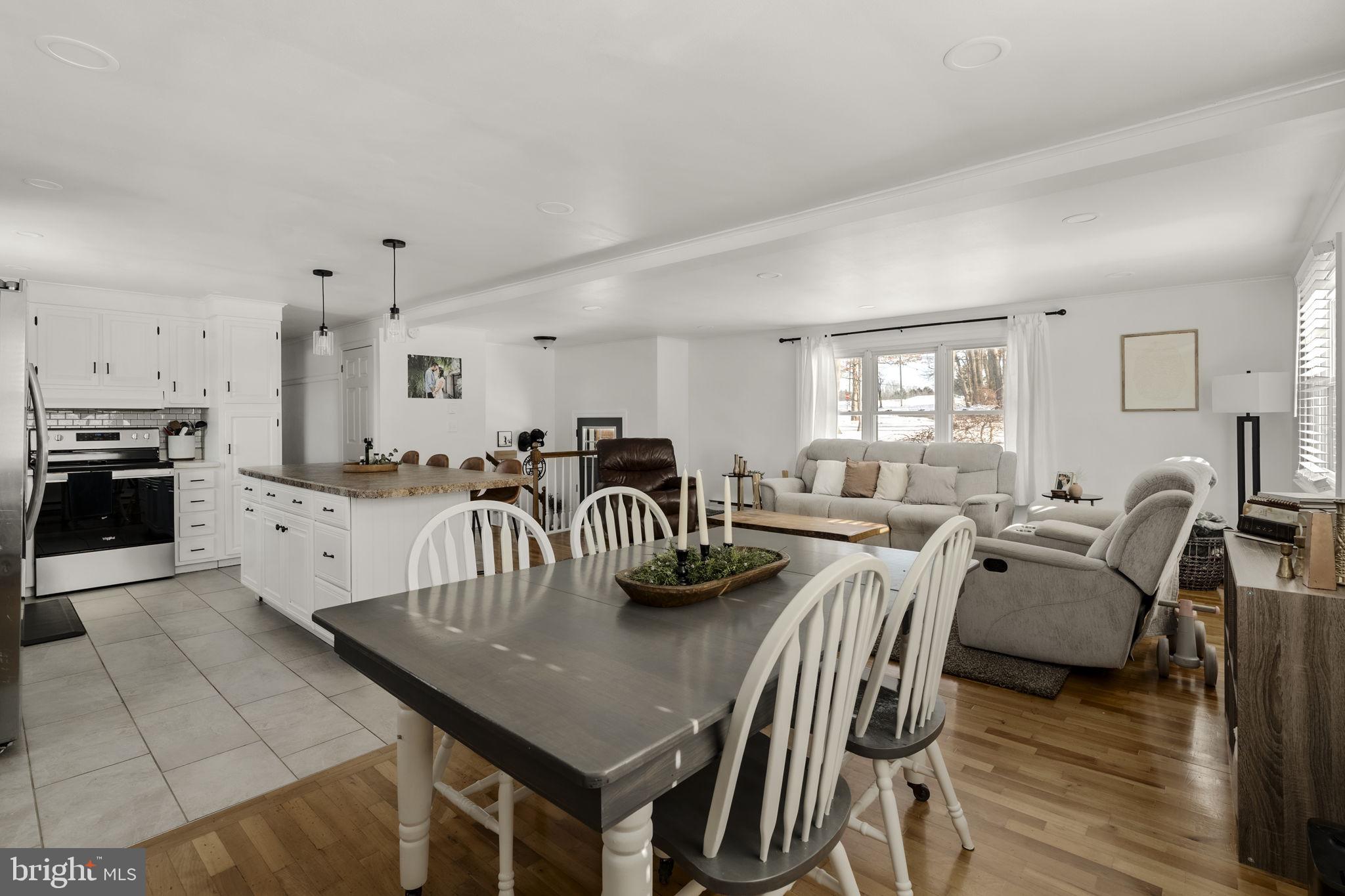 108 Red Well Road New Holland, PA 17557 - Photo 28 of 59 a large kitchen with a table and chairs