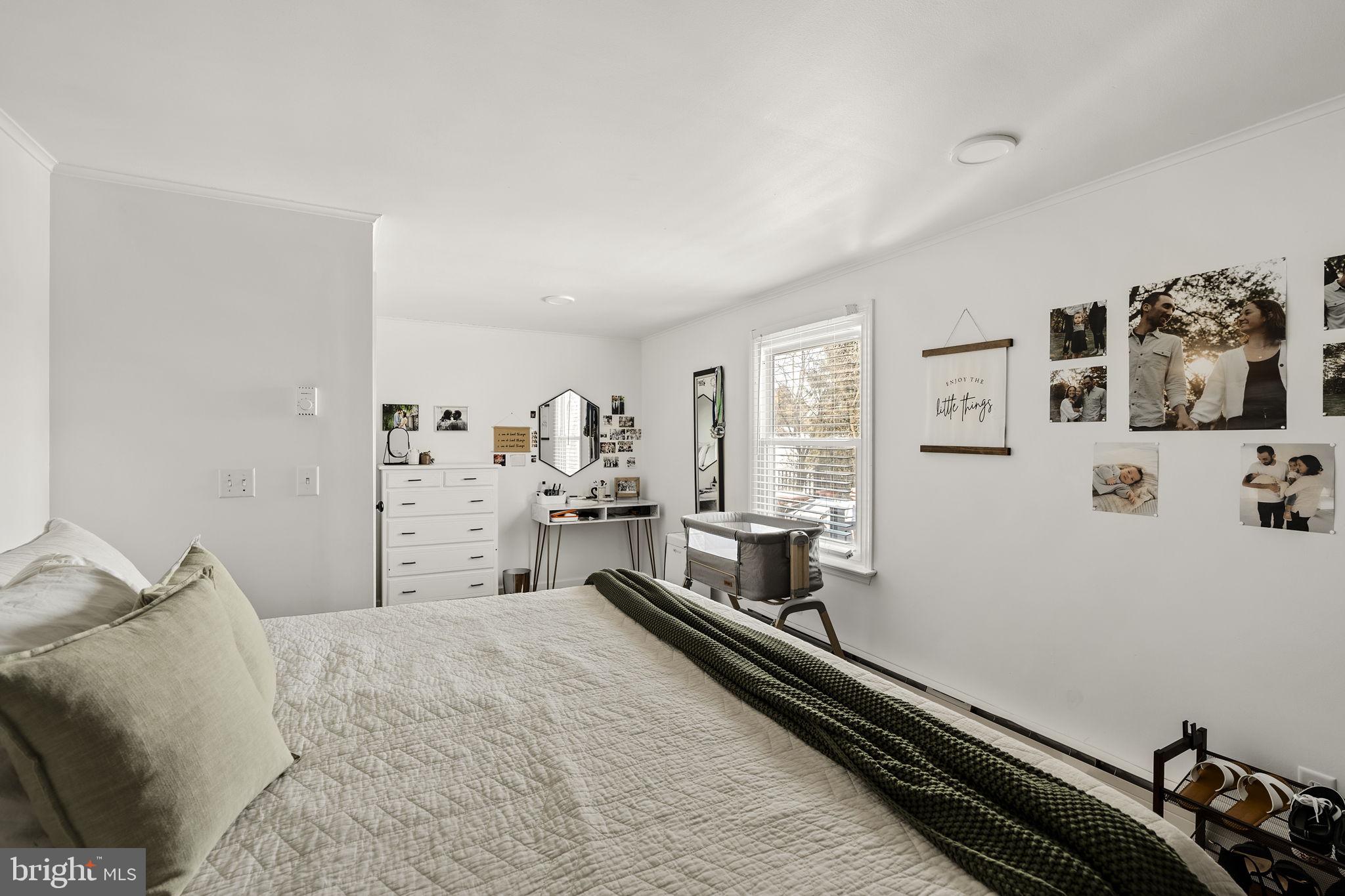 108 Red Well Road New Holland, PA 17557 - Photo 34 of 59 a large bedroom with a bed and a large window