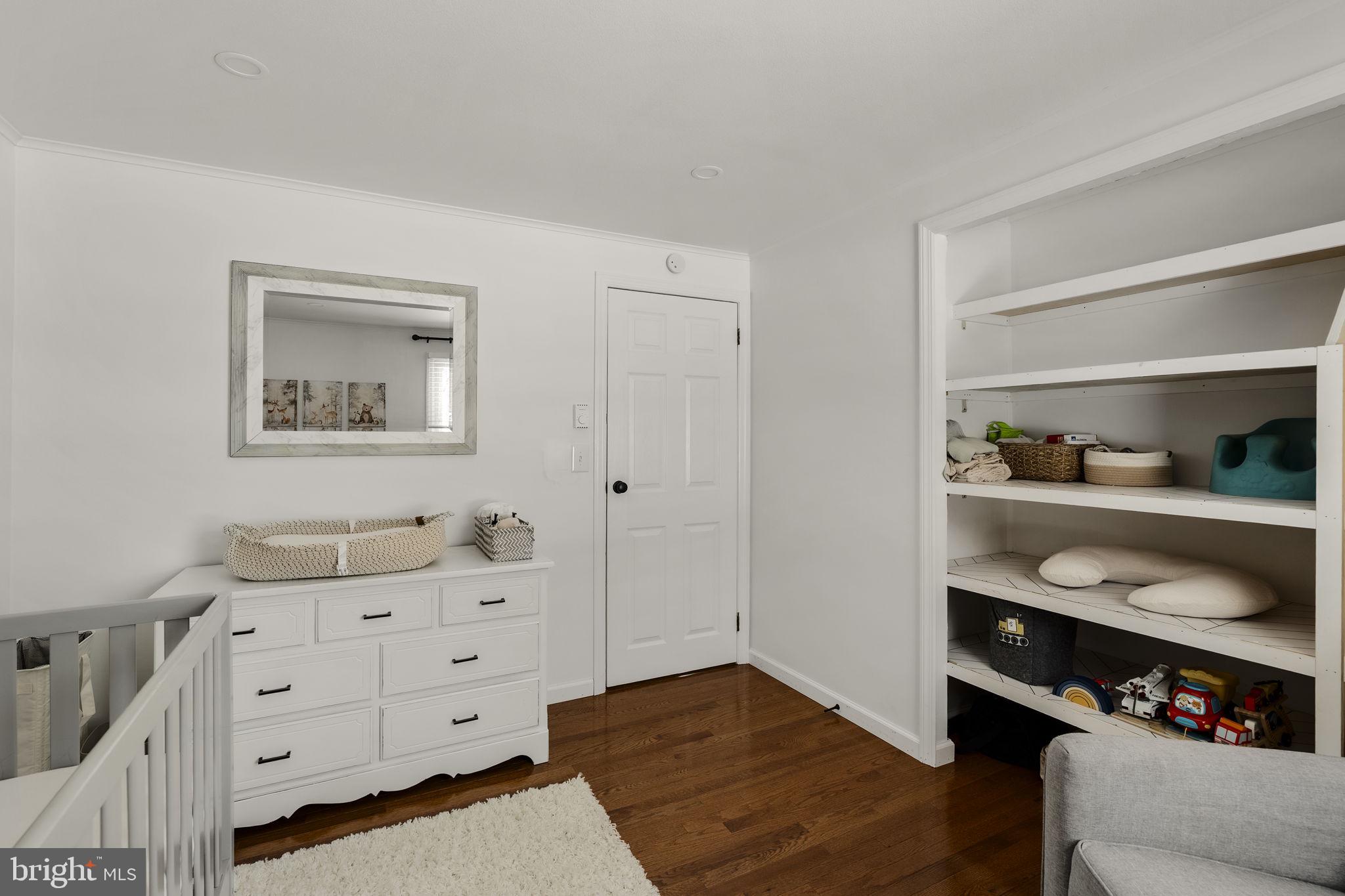 108 Red Well Road New Holland, PA 17557 - Photo 38 of 59 a room with a baby crib and a dresser